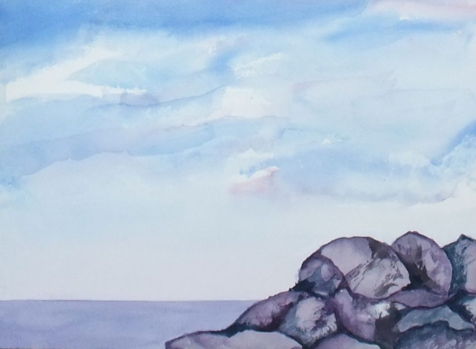 Watercolour seascape of rocks beside calm water under a soft sky