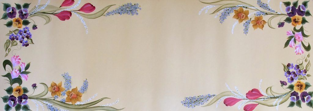 Detail of a hand-painted folk art runner with tulips, daffodils, and pansies