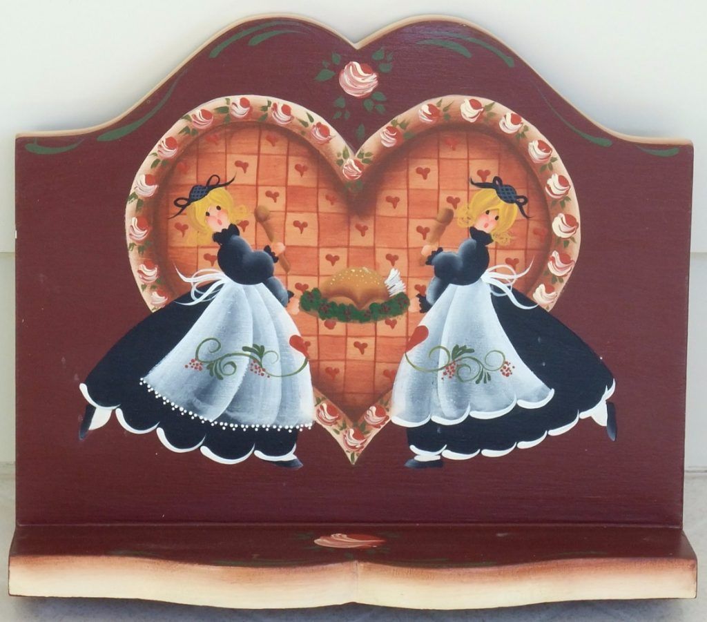 Maroon folk art shelf hand-painted with two aproned cooks and a heart framing a roast turkey