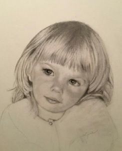 Graphite portrait of a young child with bangs